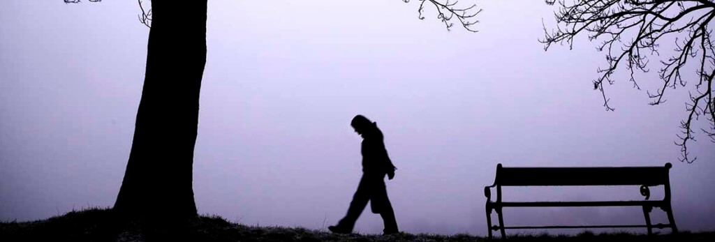 lonely person walking in winter