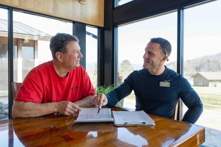 Skyterra team member reviewing a personalized plan with a guest