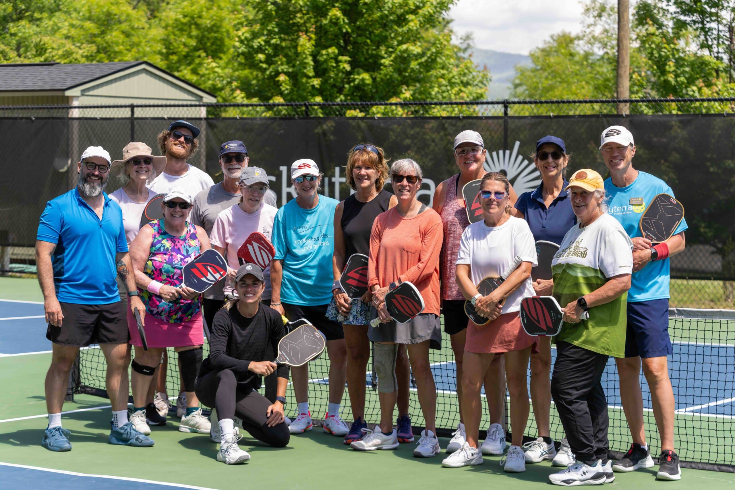 Pickleball pro Judit Castillo instructing guests on the court
